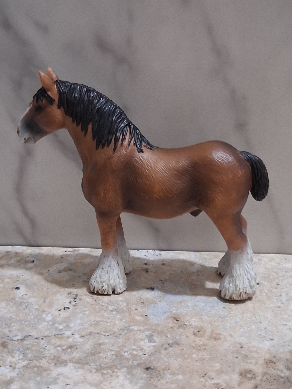 Brown Horse Figurine with Black Mane and White Feathered Legs